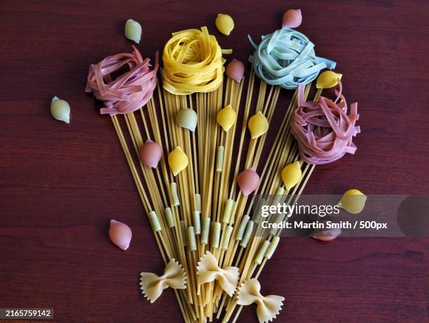 directly above shot of various pastas on table,bulgaria - massa-não-cozinhada imagens e fotografias de stock