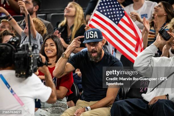 Nicole Phelps and former United States swimmer Michael Phelps attend the match while women´s quarterfinal match between Nigeria and USA on day twelve...