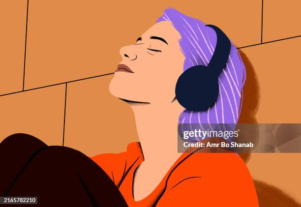 woman with purple hair enjoying music on black headphones with eyes closed against an orange background - orange background stock illustrations