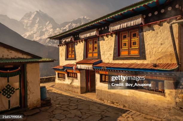 pangboche monastery at dawn. built 350 years back by lama sangwa dorjee, is the oldest monastery within the khumbhu region, nepal. - nepal village stock pictures, royalty-free photos & images