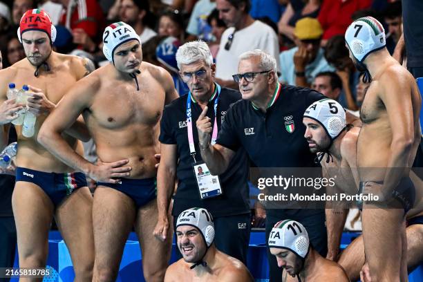 Alessandro Campagna, head coach of team Italy talks to the team during a time out of the water polo men match between team Italy and team Hungary of...