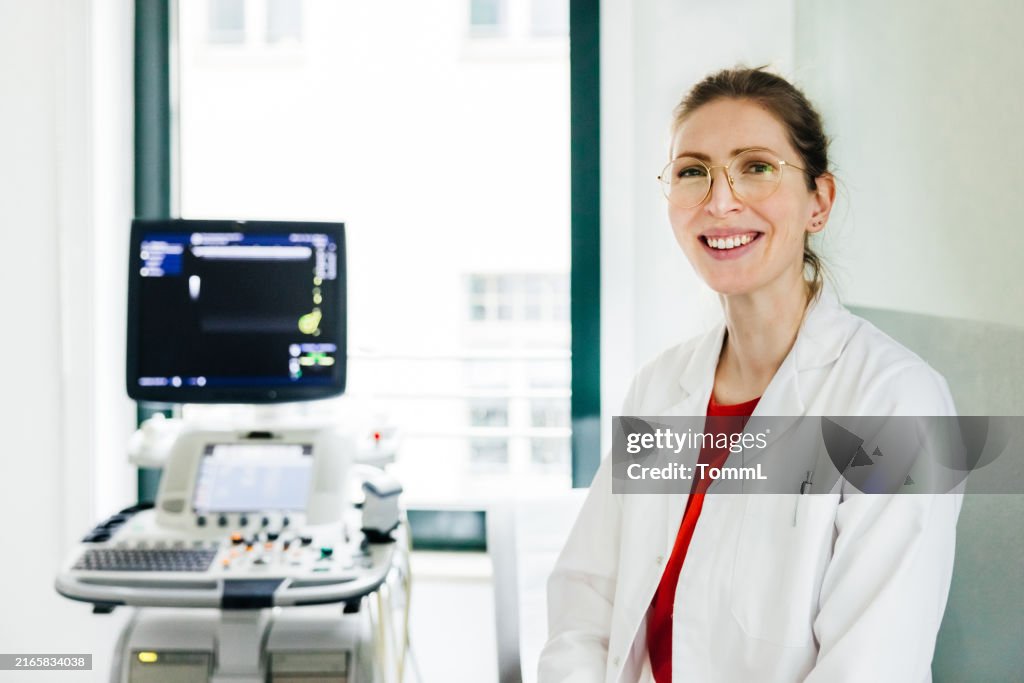 Portrait of a Smiling Female Doctor Ready to Assist Patients
