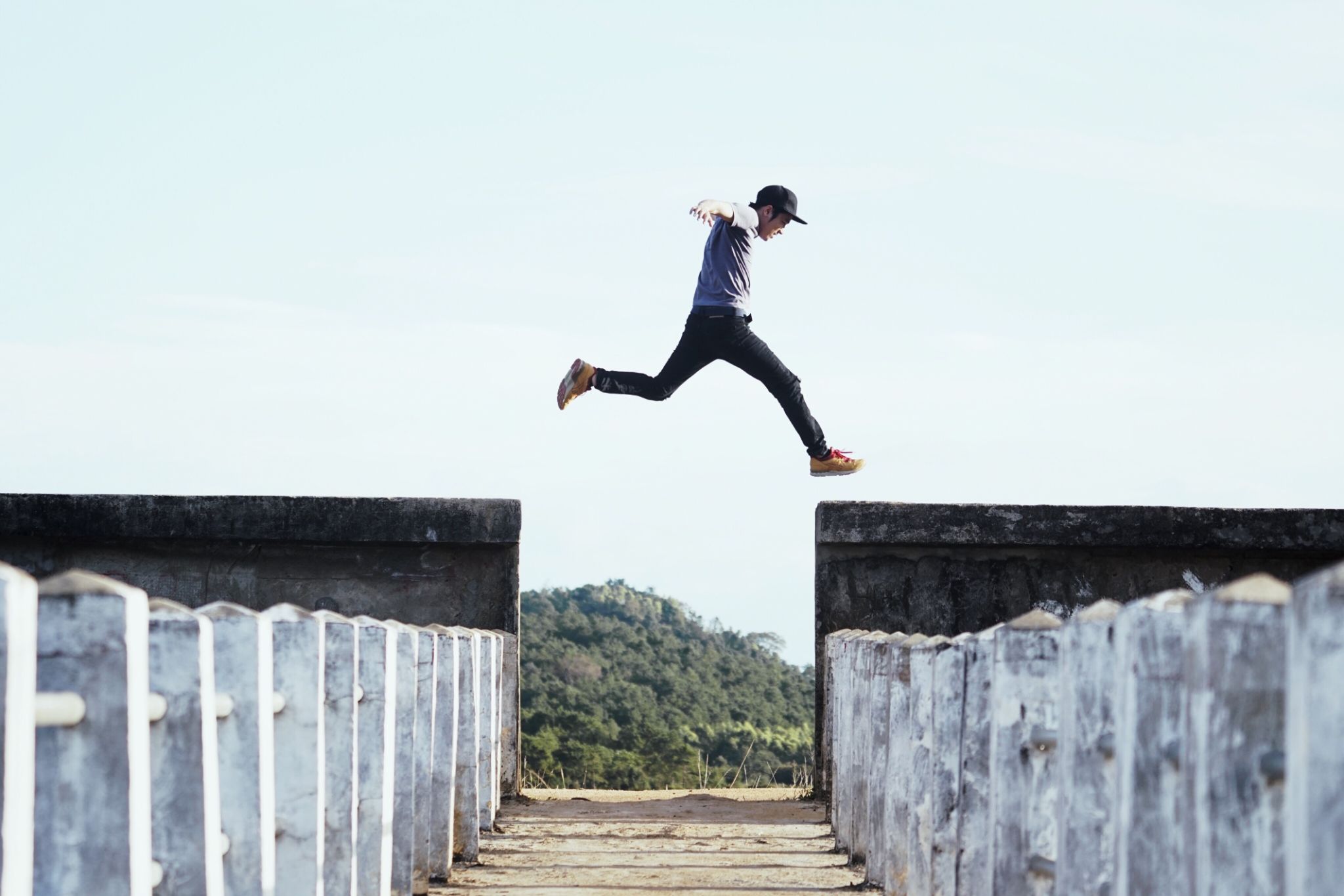 Full Length Of Man Jumping Against Sky Full Length Of Man Jumping Against Sky