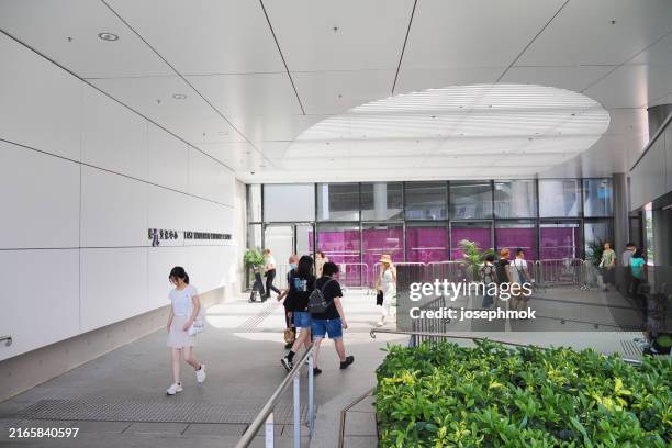 east kowloon cultural centre (ekcc)  in kowloon bay, hong kong - kowloon east stock pictures, royalty-free photos & images