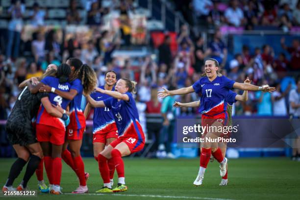 The United States is celebrating after winning the Women's Gold Medal match against Brazil during the Olympic Games Paris 2024 at Parc des Princes in...