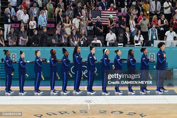 Gold medallists USA stand on the podium after the women's Gold Medal basketball match between France and the USA during the Paris 2024 Olympic Games...