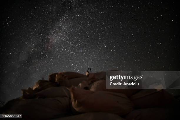 Perseid meteor shower in frontline while members of the National Guard's 13 th Brigade 'Khartiia' carry out operation during the night and early...