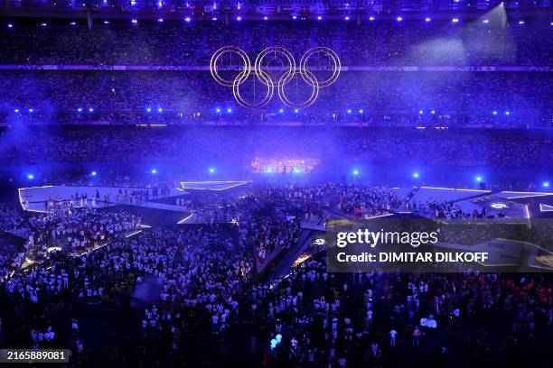 The Olympic rings are assembled and risen over the stage during the closing ceremony of the Paris 2024 Olympic Games at the Stade de France, in...