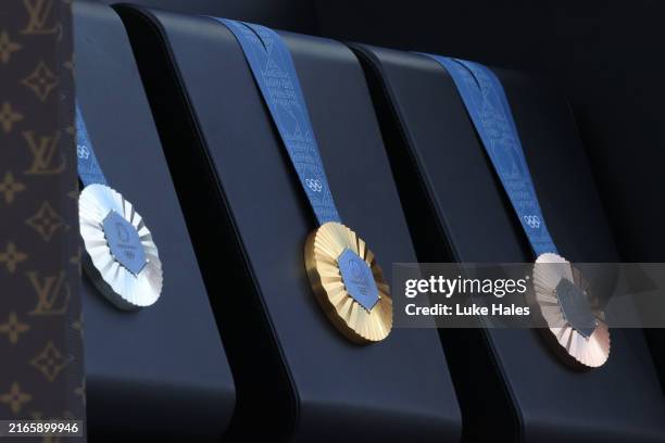 Detailed view of Silver, Gold and Bronze medals displayed onstage at Champions Park on day thirteen of the Olympic Games Paris 2024 on August 08,...