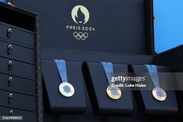 Detailed view of Silver, Gold and Bronze medals displayed onstage at Champions Park on day thirteen of the Olympic Games Paris 2024 on August 08,...