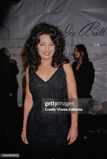 American actress Fran Drescher, wearing a black v-neck evening gown, attends the 8th Annual Fire and Ice Ball, at Paramount Studios in Los Angeles,...