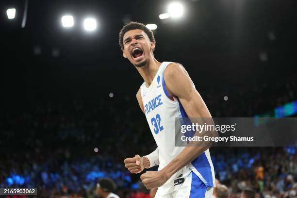 Victor Wembanyama of Team France celebrates after his team's victory against Team Germany after a Men's basketball semifinals match between Team...