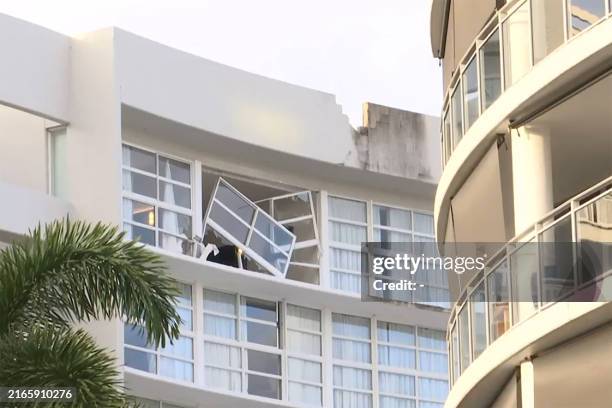 This frame grab taken from video footage provided by Australian Broadcasting Corporation on August 12 via AFPTV shows the damage after a helicopter...