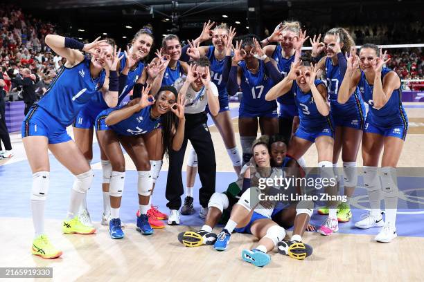 Team Italy athletes pose for a photo after winning a Women's Semifinals match against Team Türkiye on day thirteen of the Olympic Games Paris 2024 at...