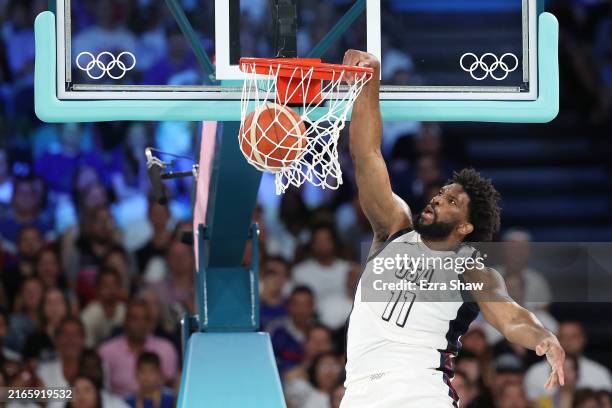 Joel Embiid of Team United States dunks the ball during a Men's basketball semifinals match between Team United States and Team Serbia on day...