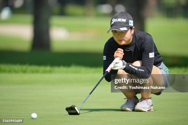 Amiyu Ozeki of Japan lines up a putt on the 2nd green during the first round of NEC KARUIZAWA72 GOLF TOURNAMENT at Karuizawa 72 Golf North Course on...