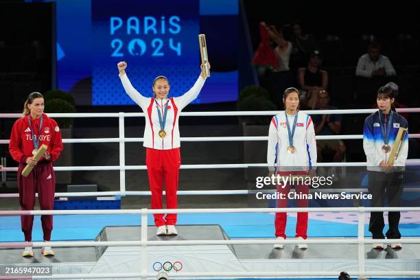 Gold medalist Chang Yuan of Team China, silver medalist Hatice Akbas of Team Turkey, bronze medalists Im Aeji of Team South Korea and Pang Cholmi of...