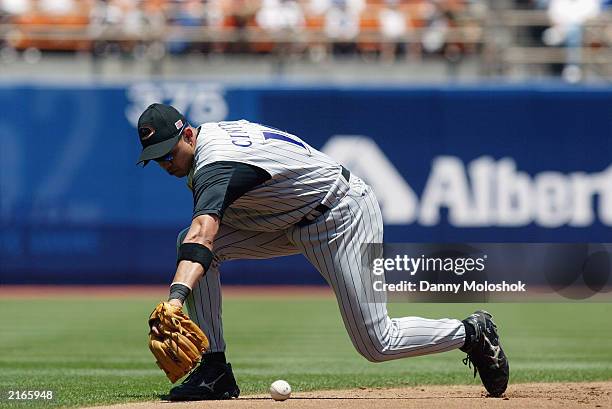 Shortstop Alex Cintron of the Arizona Diamondbacks goes for a ground ball during the National League game against the Los Angeles Dodgers at Dodger...