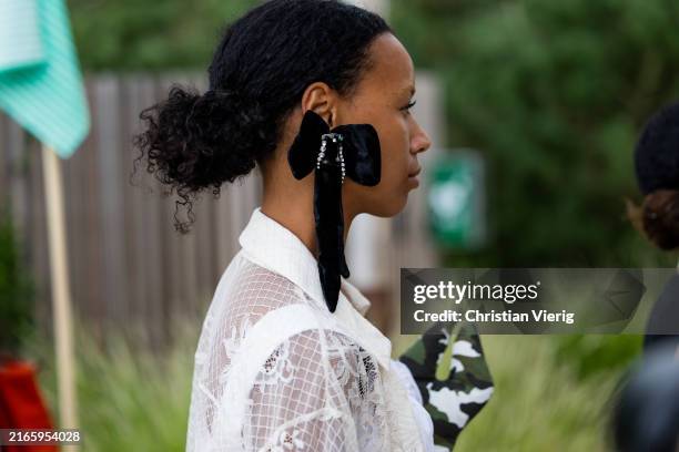 Fia Hamelijnck wears bow earring outside Marimekko during day four of the Copenhagen Fashion Week SS25 on August 08, 2024 in Copenhagen, Denmark.