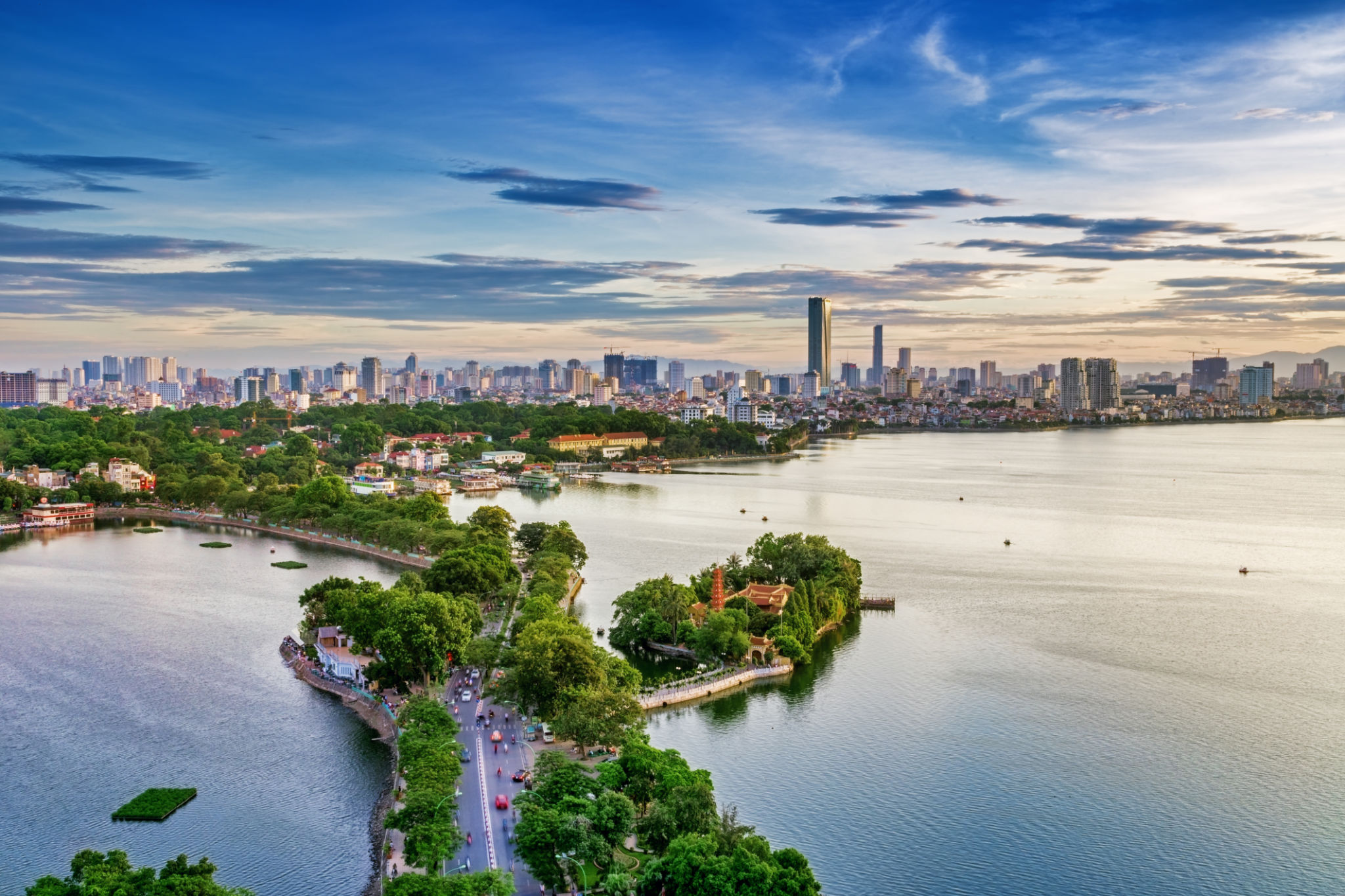 City At Waterfront Against Cloudy Sky City At Waterfront Against Cloudy Sky