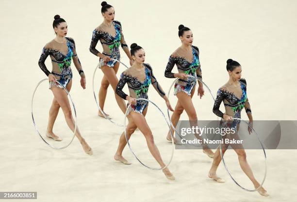 Team Italy competes during the Rhythmic Gymnastics Group All-Around Qualification on day fourteen of the Olympic Games Paris 2024 at Porte de La...
