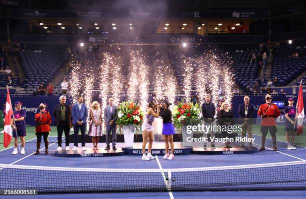 Caroline Dolehide of the United States and Desirae Krawczyk of the United States celebrate victory over Gabriela Babrowski of Canada and Erin...