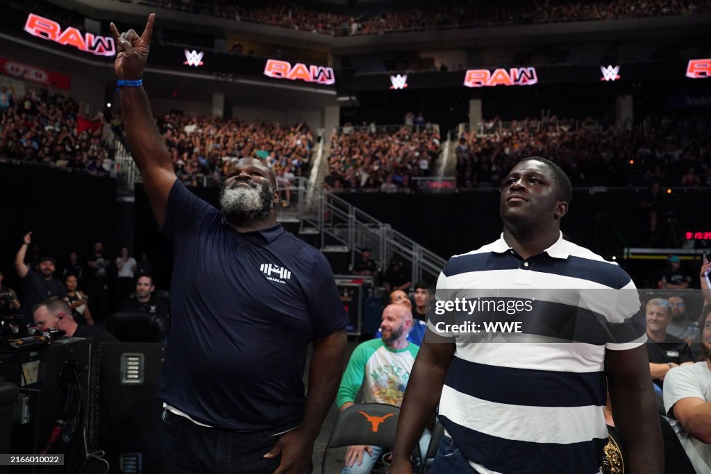Jacob Monday WWE Hall of Famer Mark Henry and Jacob Henry are ringside during ...