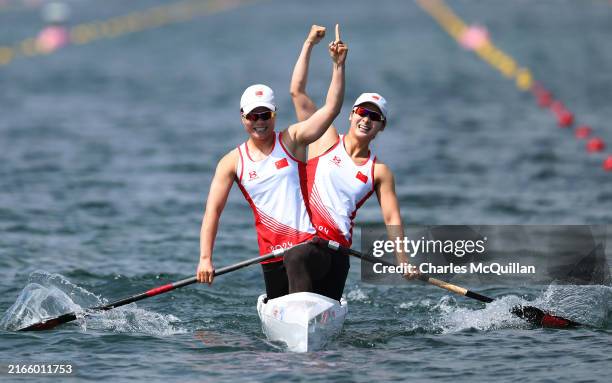 Xu Shixiao and Sun Mengya of Team People's Republic of China celebrate winning gold during the Women's Canoe Double 500m Final A on day fourteen of...