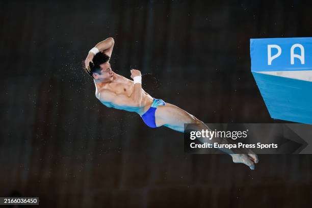 Yuan Cao of People's Republic of China competes during Men's 10m Platform Preliminary of the Diving on Aquatics Centre during the Paris 2024 Olympics...