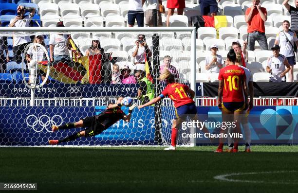 Ann-Katrin Berger of Team Germany saves the penalty taken by Alexia Putellas of Team Spain during the Women's Bronze Medal match between Spain and...