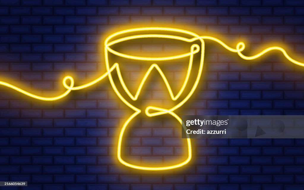 Darbuka continuous line neon icon isolated on brick wall background.
