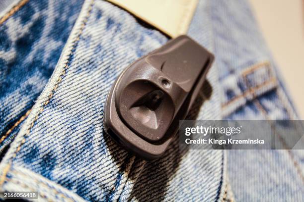 clothing security tag - sensor device stock pictures, royalty-free photos & images