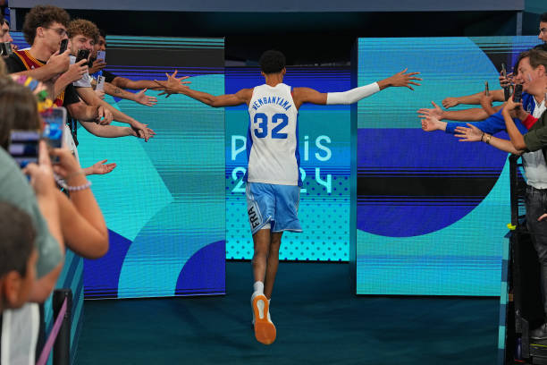 Victor Wembanyama of Team France runs off the court before the game during the Mens Gold Medal game at the AccorHotels Arena on August 10, 2024 in...