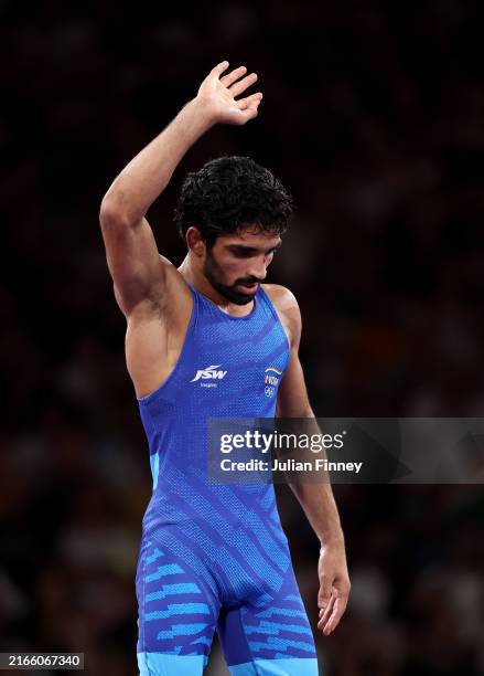 Aman Aman of Team India celebrates his victory against Darian Toi Cruz of Team Puerto Rico after the Wrestling Men's Freestyle 57kg Bronze Medal...