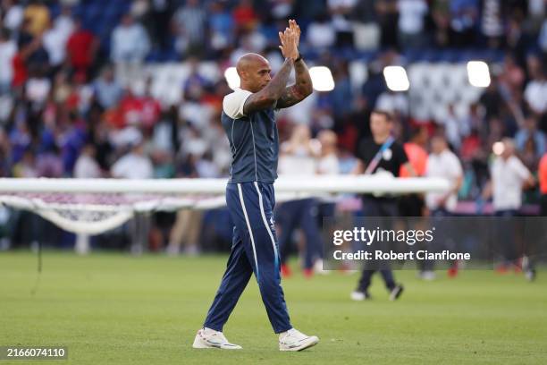 Thierry Henry, Head Coach of Team France acknowledges the fans after the Men's Gold Medal match between France and Spain during the Olympic Games...