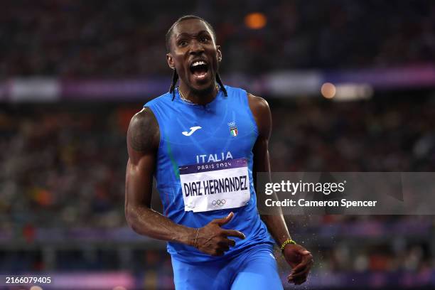 Andy Diaz Hernandez of Team Italy reacts while competing in the Men's Triple Jump Final on day fourteen of the Olympic Games Paris 2024 at Stade de...