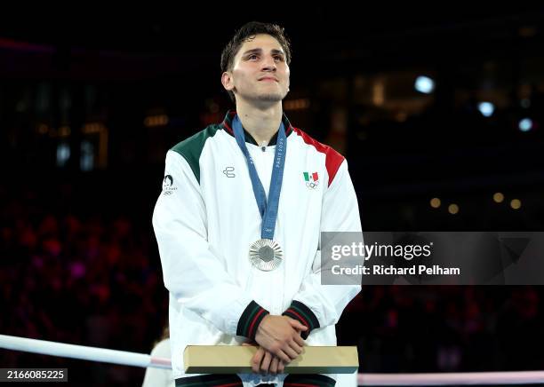 Silver Medalist Marco Alonso Verde Alvarez of Team Mexico poses on the podium during the Boxing Men's 71kg medal ceremony after the Boxing Men's 71kg...