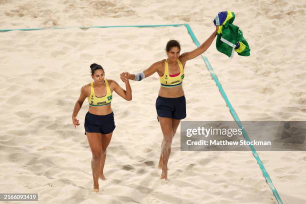 Eduarda Santos Lisboa and Ana Patricia Silva Ramos of Team Brazil celebrate after winning a Women's Gold Medal Match against Team Canada on day...