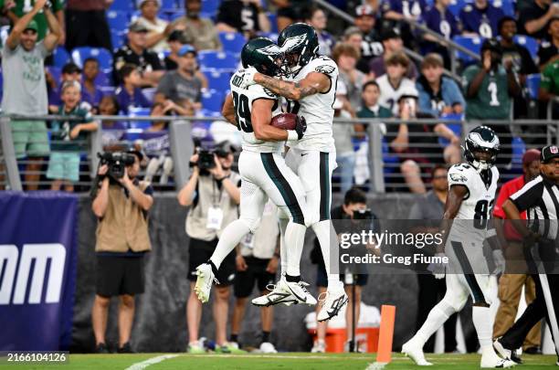 Will Shipley of the Philadelphia Eagles celebrates with teammates after scoring a touchdown in the first quarter against the Baltimore Ravens in a...