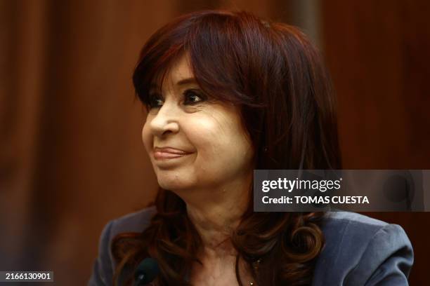 Former Argentine President Cristina Fernandez de Kirchner looks on as she testifies as a witness in the trial for her assassination attempt at the...