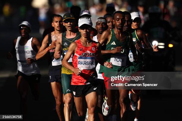 Akira Akasaki of Team Japan leads the field during the Men's Marathon during day fifteen of the Olympic Games Paris 2024 at Esplanade Des Invalides...