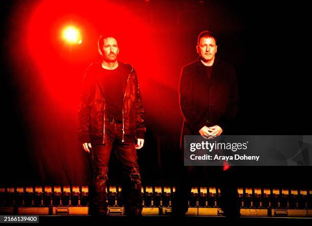 Music group Nine Inch Nails members Trent Reznor and Atticus Ross appear at the Disney Entertainment Showcase at D23: The Ultimate Disney Fan Event...