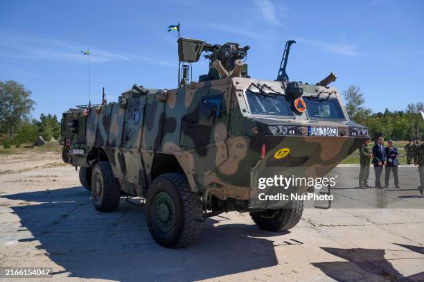 Polish-made reconnaissance light armoured troop carriers KLESZCZ are being pictured in the 1st Warsaw Armoured Brigade base in Wesola, near Warsaw,...
