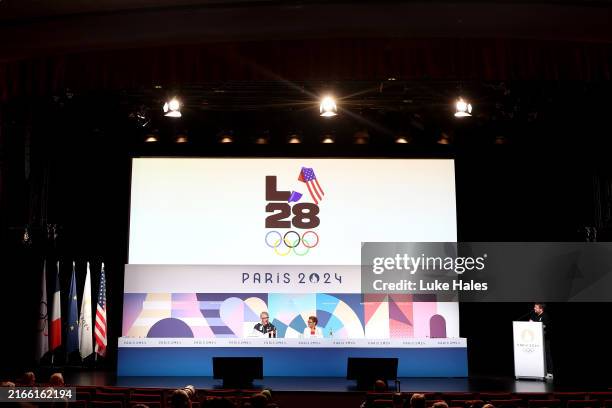 General view as the LED screen, depicting the LA28 Olympics logo, is seen whilst Casey Wasserman, LA28 Chairperson and President, and Karen Bass,...