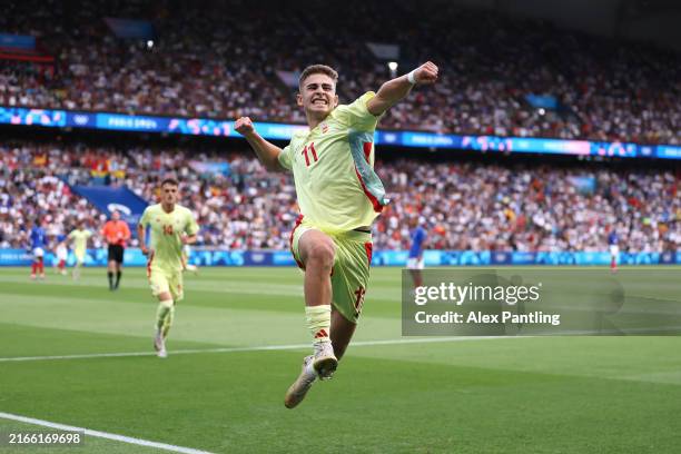 Fermin Lopez of Team Spain celebrates scoring his team's first goal during the Men's Gold Medal match between France and Spain during the Olympic...