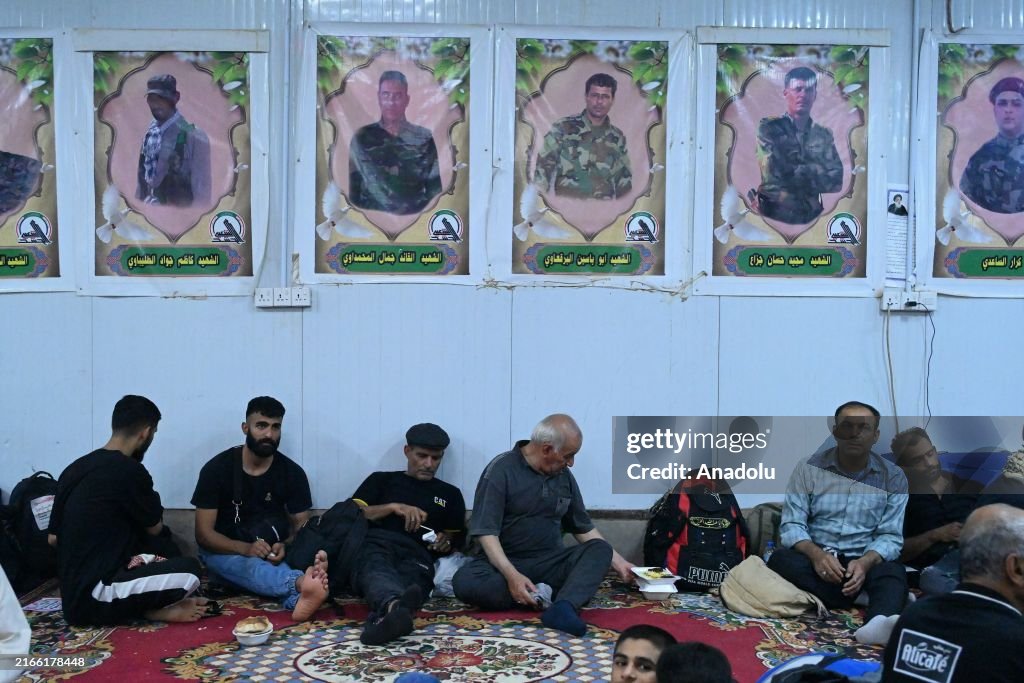 Muslims In Iraq People march through Shalamcheh border crossing in Iraq's Basra... News ...