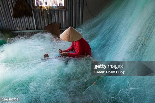 Turquoise Fishnet 2,669 Vietnamese Fishing Net Stock Photos, High-Res Pictures, and ...