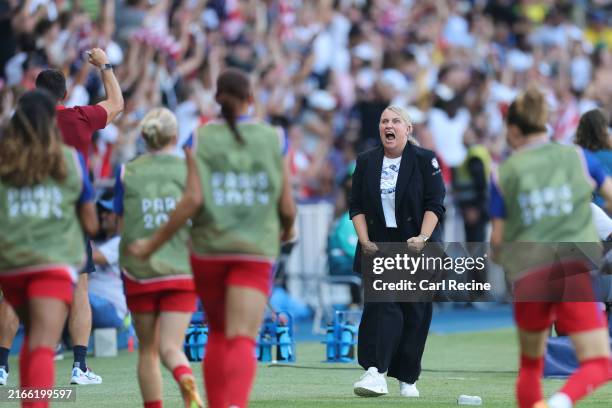 Emma Hayes, Head Coach of Team United States celebrates after Mallory Swanson of Team United States scores her team's first goal during the Women's...