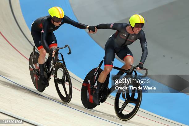 Oliver Wood and Mark Stewart of Team Great Britain take over during the Men's Madison Final on day fifteen of the Olympic Games Paris 2024 at...