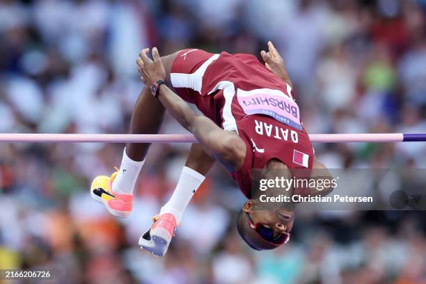 Mutaz Essa Barshim of Team Qatar competes in the Men's High Jump Final on day fifteen of the Olympic Games Paris 2024 at Stade de France on August...
